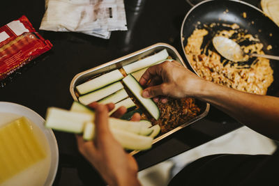 High angle view of woman preparing food