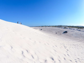 Scenic view of desert against clear sky