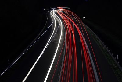 Light trails against sky at night