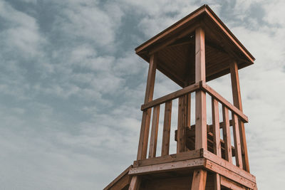 Low angle view of beach tower against sky