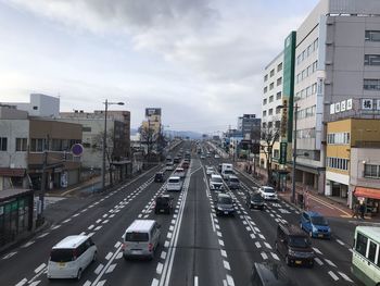 High angle view of city street against sky