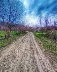 Road passing through field