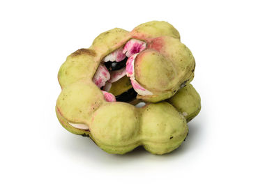 Close-up of fruits against white background