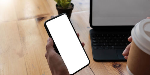 High angle view of man using mobile phone