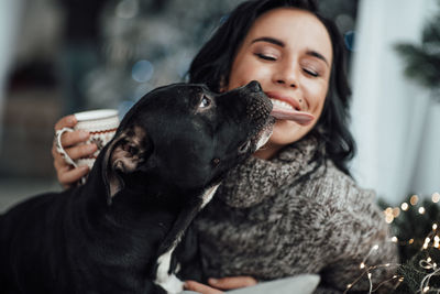 Portrait of woman with dog