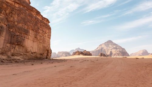 Rock formations in desert against sky