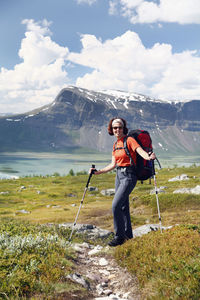 Woman hiking in mountains