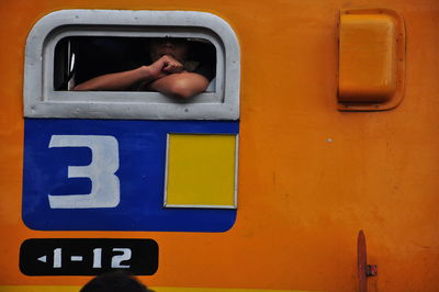 Man seen through train window