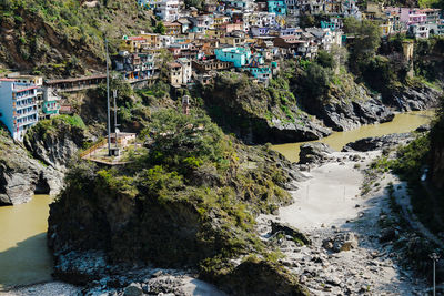 High angle view of river amidst buildings