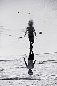 Full length of man at beach against sky