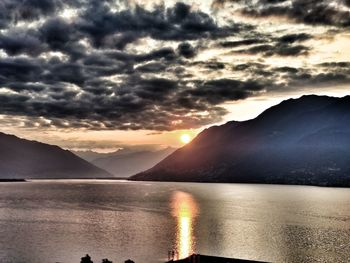 Scenic view of lake against sky during sunset