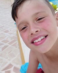 Close-up portrait of smiling boy