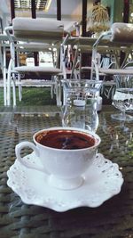 Close-up of coffee on wooden table