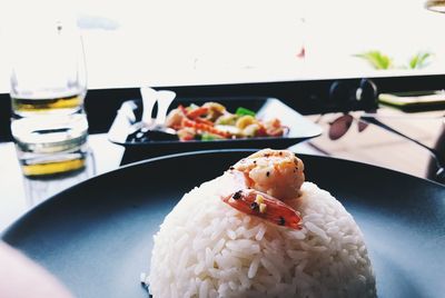 Close-up of food served on table