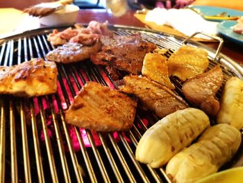 Close-up of meat on barbecue grill