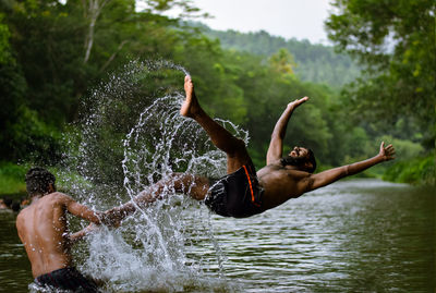 Man surfing in water