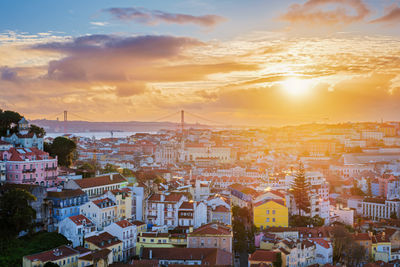 High angle view of townscape against sky during sunset