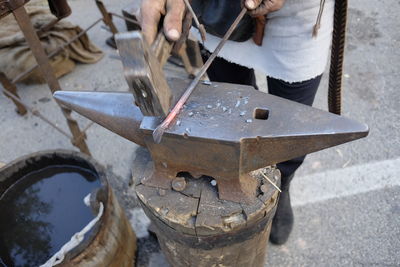 Man working on metal