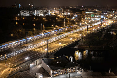 High angle view of illuminated bridge in city at night