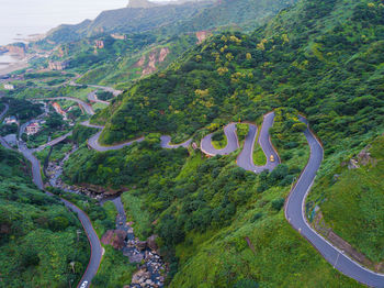 High angle view of road amidst trees