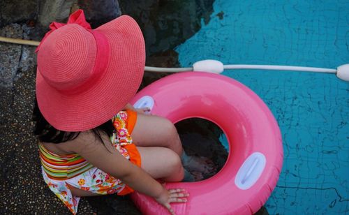 Overhead view of girl in swimming pool