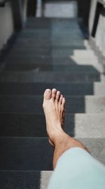 Foot on stairs