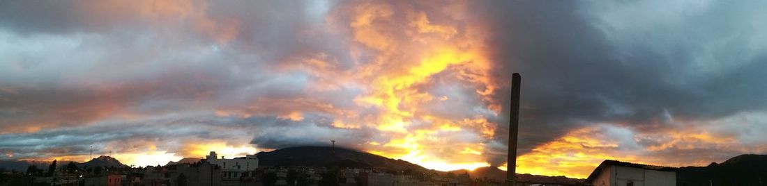 Panoramic view of storm clouds over city