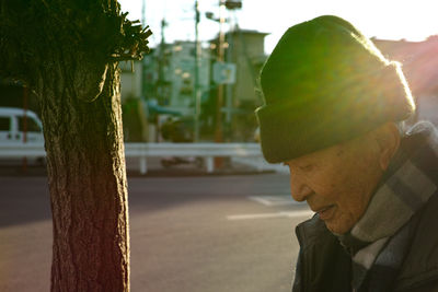 Portrait of man on street in city