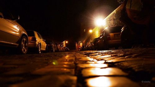 Surface level of illuminated street lights at night