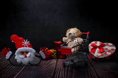 Close-up of stuffed toy against black background