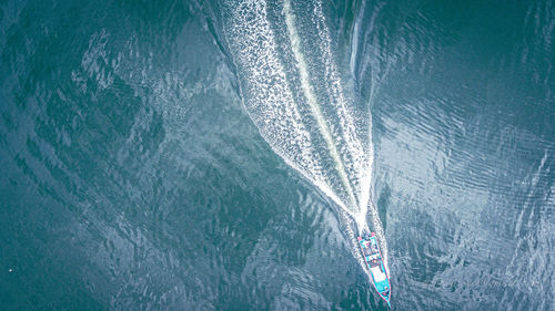 High angle view of sea seen through boat