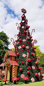 Low angle view of christmas tree against sky