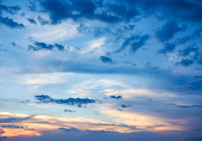 Low angle view of clouds in sky during sunset