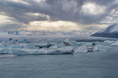 Jokulsarlon glacier lagoon with mountain in background during extreme weather