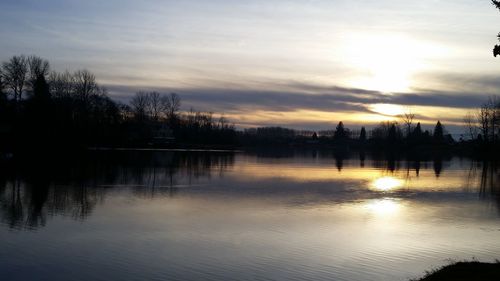 Scenic view of lake during sunset