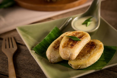 High angle view of bread in plate on table