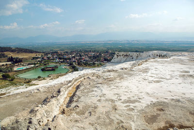 White calcium mountain with granite with small waterfall in summer in pamukkale turkey