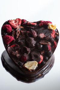 High angle view of dessert in bowl against white background