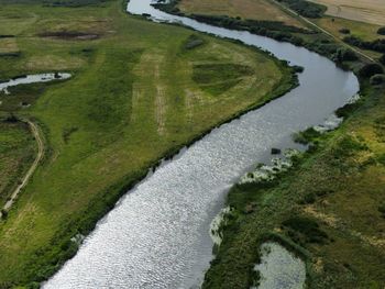 High angle view of road amidst landscape against sky