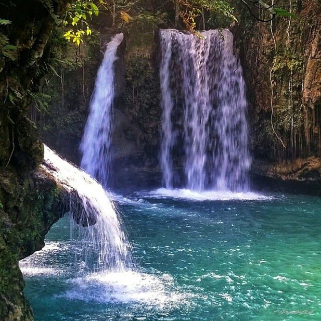 water, motion, waterfall, flowing water, long exposure, beauty in nature, scenics, splashing, nature, waterfront, flowing, rock - object, surf, power in nature, idyllic, forest, blurred motion, rock formation, environment, day
