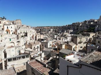 Aerial view of townscape against clear sky