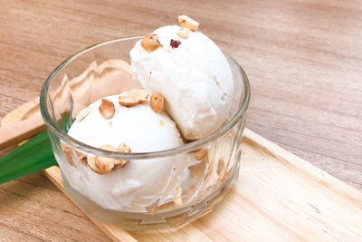 Close-up of ice cream in glass on table