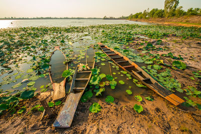 High angle view of abandoned boats at beach