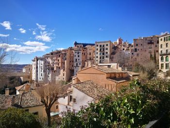 Town against sky in city