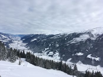 Scenic view of snowcapped mountains against sky