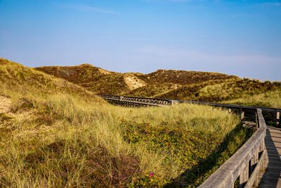 Scenic view of land against sky