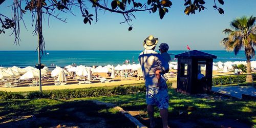 Built structure on beach against sky