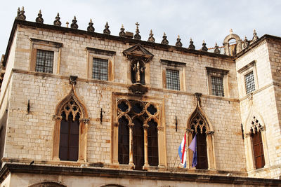 Low angle view of historic building against sky