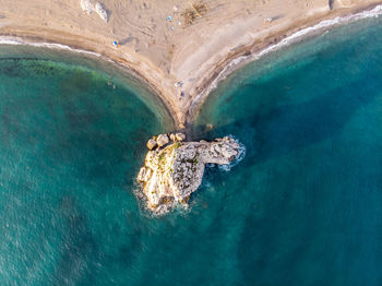 High angle view of rock in sea