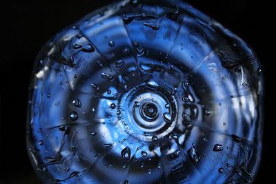 High angle view of water drops on metal